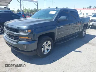 2018 Chevrolet Silverado 1500 LT with VIN 3GCUKREC1JG511846, listed as a IAAI auction lot 42024170 with 121,532 mi miles and . Bid and sale history available at DreamBid. Image 17.
