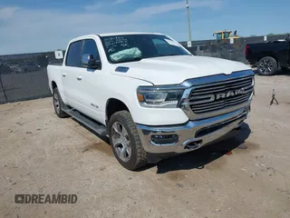 2023 Ram 1500 Laramie with VIN 1C6SRFJT0PN508550, listed as a IAAI auction lot 41913849 with 57,765 mi miles and . Bid and sale history available at DreamBid. Image 1.