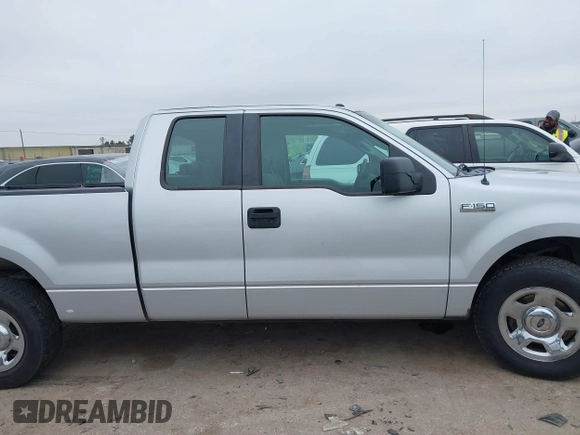 2007 Ford F-150 STX with VIN 1FTRX12W27FA79916, listed as a IAAI auction lot 41581837 with 209,945 mi miles and . Bid and sale history available at DreamBid. Image 13.
