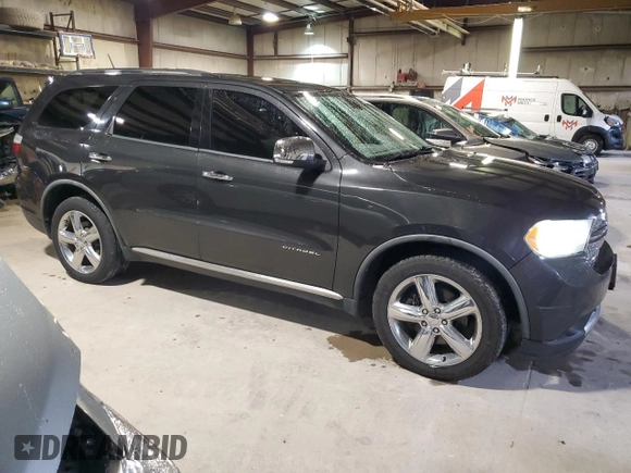 2011 Dodge Durango Citadel with VIN 1D4SE5GT4BC613797, listed as a Copart auction lot 54893175 with 196,840 mi miles and Salvage title. Bid and sale history available at DreamBid. Image 4.
