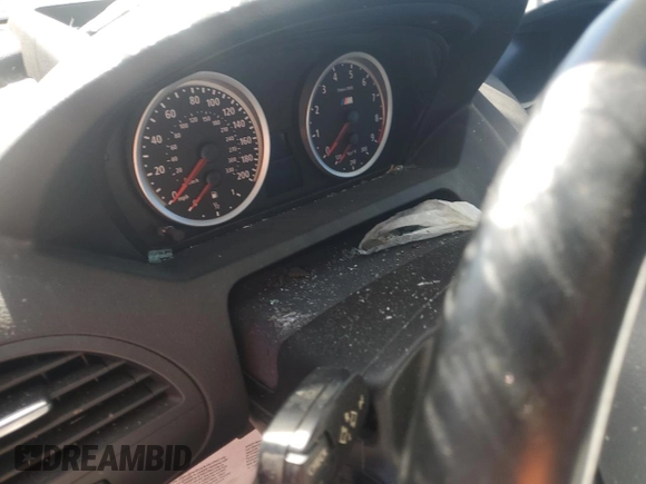 2010 BMW M6 z VIN WBSEH9C52ACY25220, wystawiony jako Copart lot #80767324 z przebiegiem Nie podano mil oraz Szkoda całkowita • Salvage title. Historia ofert i sprzedaży dostępna na DreamBid. Obrazek 9.