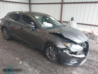 2014 Mazda Mazda3 i Touring with VIN 3MZBM1L75EM109082, listed as a IAAI auction lot 41625740 with 123,618 mi miles. Bid and sale history available at carsss.com. Image 1.