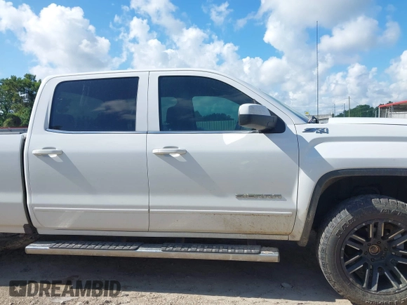 2017 GMC Sierra 1500 SLE with VIN 3GTU2MEC6HG239985, listed as a IAAI auction lot 42542350 with 241,340 mi miles and . Bid and sale history available at DreamBid. Image 13.