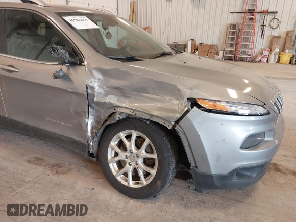 2014 Jeep Cherokee Latitude with VIN 1C4PJLCS1EW106004, listed as a IAAI auction lot 41786457 with 145,588 mi miles. Bid and sale history available at carsss.com. Image 6.