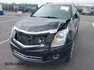 2015 Cadillac SRX Performance Collection with VIN 3GYFNCE3XFS638994, listed as a IAAI auction lot 42243558 with 141,704 mi miles and . Bid and sale history available at DreamBid. Image 6.