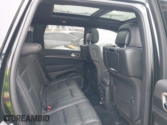 2015 Jeep Grand Cherokee Summit with VIN 1C4RJEJG3FC626002, listed as a IAAI auction lot 41295706 with 85,958 mi miles and . Bid and sale history available at DreamBid. Image 8.