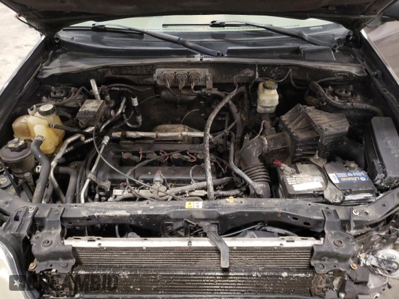 2006 Mercury Mariner Convenience with VIN 4M2YU56Z96KJ14418, listed as a Copart auction lot 47179135 with 163,557 mi miles and Salvage title. Bid and sale history available at DreamBid. Image 12.