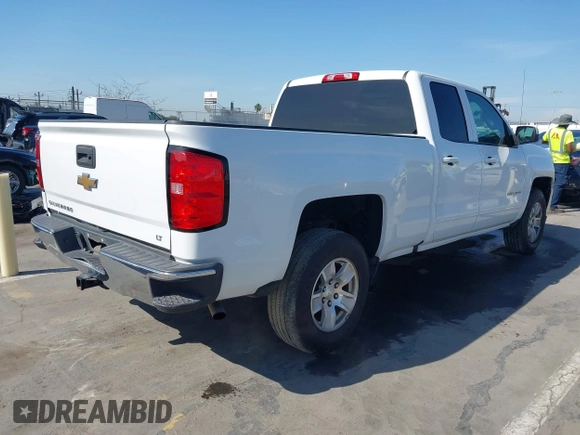 2017 Chevrolet Silverado 1500 LT with VIN 1GCRCREC5HZ348972, listed as a IAAI auction lot 41990841 with 55,374 mi miles and . Bid and sale history available at DreamBid. Image 4.