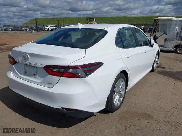 2023 Toyota Camry LE with VIN 4T1C11AK7PU135832, listed as a IAAI auction lot 41711116 with 43,115 mi miles. Bid and sale history available at carsss.com. Image 4.