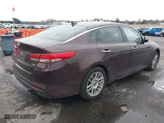 2016 Kia Optima EX with VIN 5XXGU4L31GG004714, listed as a IAAI auction lot 41183230 with 108,084 mi miles. Bid and sale history available at carsss.com. Image 4.