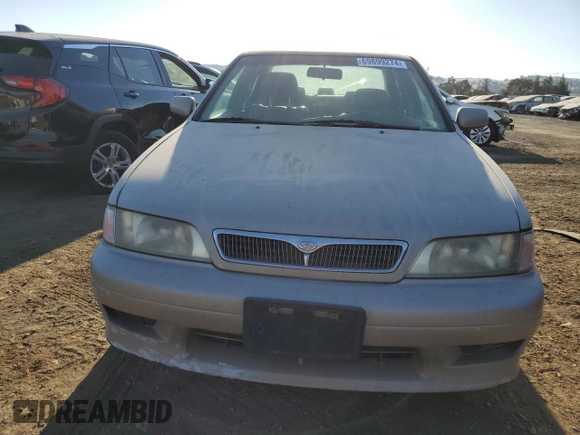 2001 Infiniti G20 Luxury z VIN JNKCP11A01T400404, wystawiony jako Copart lot #69899274 z przebiegiem 243 332 mil mil oraz Szkoda całkowita • Salvage title. Historia ofert i sprzedaży dostępna na DreamBid. Obrazek 5.