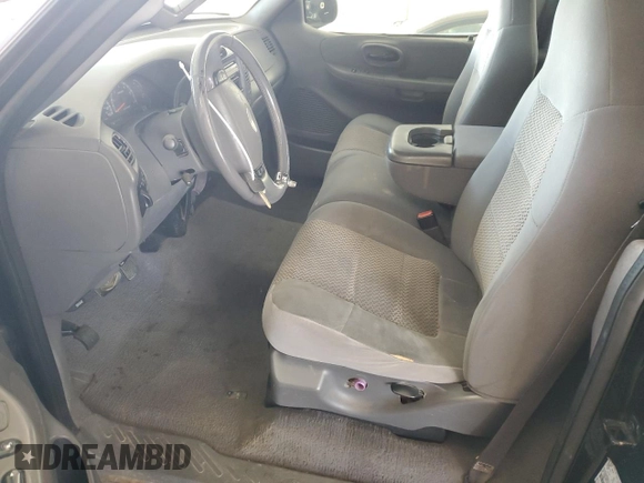 2003 Ford F-150 with VIN 2FTRF08L03CA03160, listed as a Copart auction lot 51591535 with 220,630 mi miles and Salvage title. Bid and sale history available at DreamBid. Image 7.