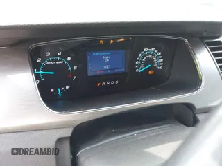 2013 Ford Taurus SEL with VIN 1FAHP2E84DG188503, listed as a IAAI auction lot 41800277 with 215,015 mi miles. Bid and sale history available at carsss.com. Image 7.