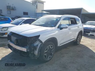 2023 Hyundai Santa Fe Limited z VIN 5NMS5DA19PH010481, wystawiony jako IAAI lot #41951919 z przebiegiem 31 667 mil mil oraz . Historia ofert i sprzedaży dostępna na DreamBid. Obrazek 2.