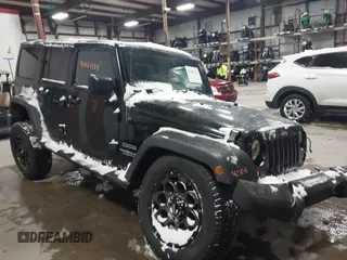 2012 Jeep Wrangler Unlimited Sport z VIN 1C4BJWDG0CL201528, wystawiony jako IAAI lot #41067134 z przebiegiem 134 060 mil mil oraz . Historia ofert i sprzedaży dostępna na DreamBid. Obrazek 1.