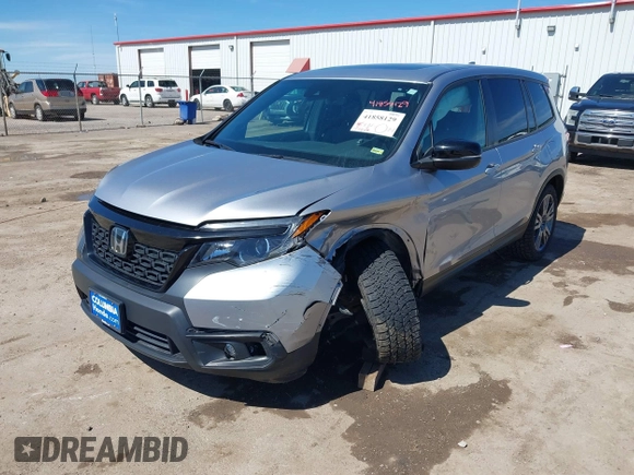 2021 Honda Passport EX-L with VIN 5FNYF8H51MB024752, listed as a IAAI auction lot 41858129 with 77,545 mi miles and . Bid and sale history available at DreamBid. Image 2.