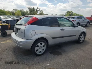 2001 Ford Focus ZX3 z VIN 3FAFP31341R244564, wystawiony jako Copart lot #55472105 z przebiegiem 168 296 mil mil oraz Szkoda całkowita • Salvage title. Historia ofert i sprzedaży dostępna na DreamBid. Obrazek 3.
