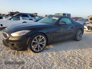 2020 BMW Z4 sDrive30i with VIN WBAHF3C03LWW64905, listed as a Copart auction lot 77010554 with 27,612 mi miles and Salvage Title. Bid and sale history available at carsss.com. Image 1.