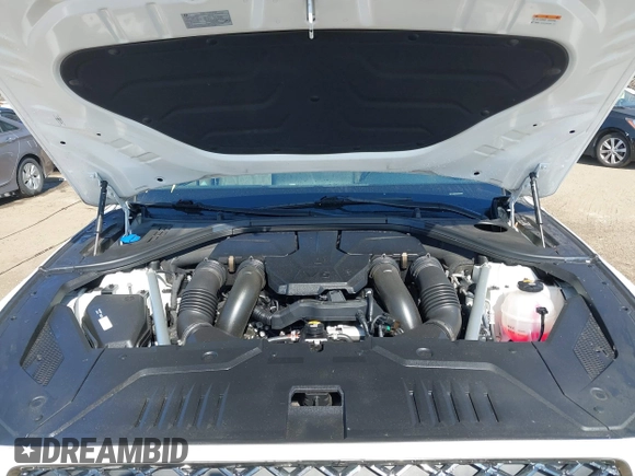 2022 Genesis GV70 Sport z VIN KMUMCDTC4NU039497, wystawiony jako IAAI lot #41668778 z przebiegiem 31 545 mil mil oraz . Historia ofert i sprzedaży dostępna na DreamBid. Obrazek 10.