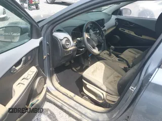 2019 Hyundai Kona SE with VIN KM8K12AA0KU257384, listed as a IAAI auction lot 42049777 with 91,000 mi miles. Bid and sale history available at carsss.com. Image 6.