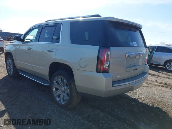 2016 GMC Yukon Denali with VIN 1GKS2CKJ5GR393269, listed as a IAAI auction lot 41963630 with 158,584 mi miles and . Bid and sale history available at DreamBid. Image 3.