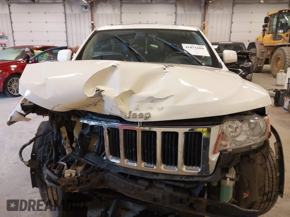 2011 Jeep Grand Cherokee 70th Anniversary with VIN 1J4RR4GG4BC702759, listed as a IAAI auction lot 41871604 with 143,583 mi miles. Bid and sale history available at carsss.com. Image 12.