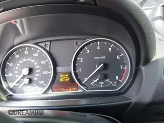 2012 BMW 1 Series 135i with VIN WBAUN7C57CVM26243, listed as a IAAI auction lot 42222452 with 110,795 mi miles and . Bid and sale history available at DreamBid. Image 7.