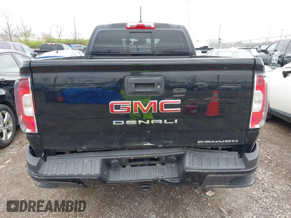 2021 GMC Canyon 4WD Denali with VIN 1GTG6EEN6M1260580, listed as a IAAI auction lot 41918693 with 52,085 mi miles. Bid and sale history available at carsss.com. Image 6.