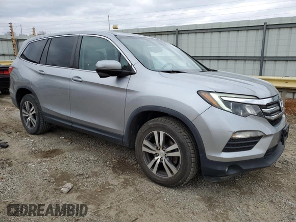 2017 Honda Pilot EX-L with VIN 5FNYF6H59HB008597, listed as a Copart auction lot 42166495 with 221,452 mi miles and Salvage Title. Bid and sale history available at DreamBid. Image 4.