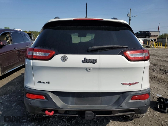 2015 Jeep Cherokee Trailhawk z VIN 1C4PJMBS6FW558653, wystawiony jako Copart lot #51066195 z przebiegiem 32 905 mil mil oraz Szkoda całkowita • Salvage title. Historia ofert i sprzedaży dostępna na DreamBid. Obrazek 6.