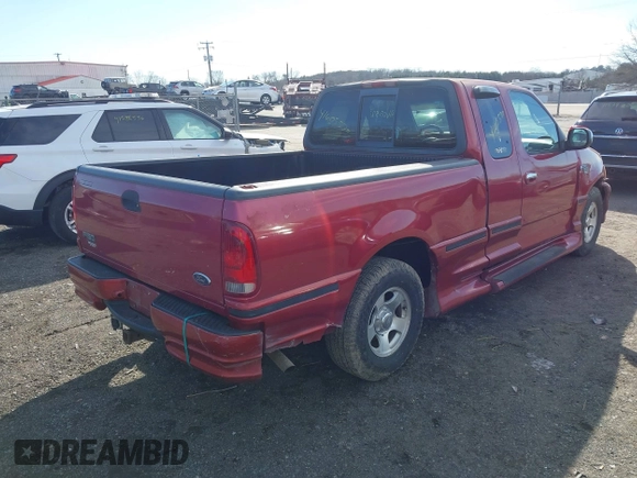 2000 Ford F-150 XL with VIN 2FTRX17W2YCA79002, listed as a IAAI auction lot 41605570 with 322,154 mi miles. Bid and sale history available at carsss.com. Image 4.