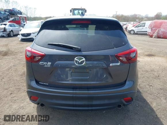 2016 Mazda CX-5 Grand Touring z VIN JM3KE4DY1G0893119, wystawiony jako IAAI lot #42049614 z przebiegiem 102 506 mil mil oraz . Historia ofert i sprzedaży dostępna na DreamBid. Obrazek 16.
