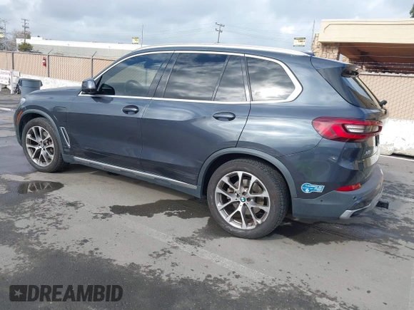 2021 BMW X5 xDrive45e with VIN 5UXTA6C09M9D26035, listed as a IAAI auction lot 41788981 with 60,571 mi miles and . Bid and sale history available at DreamBid. Image 3.