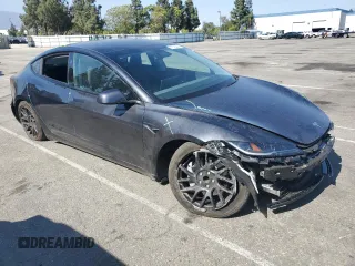 2025 Tesla Model 3 Long Range with VIN 5YJ3E1EA8SF896333, listed as a Copart auction lot 61876445 with 5,690 mi miles and Salvage title. Bid and sale history available at DreamBid. Image 4.
