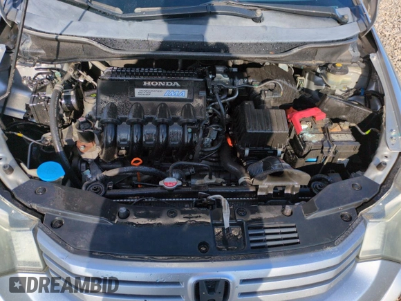 2010 Honda Insight LX with VIN JHMZE2H51AS011243, listed as a Copart auction lot 54445555 with 224,722 mi miles and Salvage Title. Bid and sale history available at DreamBid. Image 11.