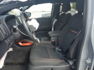 2023 Nissan Frontier PRO-4X with VIN 1N6ED1EK3PN653684, listed as a Copart auction lot 69177074 with 35,528 mi miles and Salvage Title. Bid and sale history available at carsss.com. Image 7.
