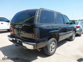 2005 Chevrolet Tahoe LS with VIN 1GNEC13VX5R180270, listed as a IAAI auction lot 42004969 with 164,258 mi miles. Bid and sale history available at carsss.com. Image 4.