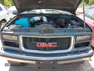 1996 GMC Sierra 1500 z VIN 1GTEK19R6TE514322, wystawiony jako IAAI lot #42253821 z przebiegiem 190 491 mil mil oraz . Historia ofert i sprzedaży dostępna na DreamBid. Obrazek 10.
