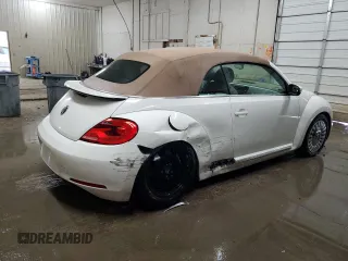 2013 Volkswagen Beetle 2.5L w/Sound/Nav z VIN 3VW5P7AT7DM811619, wystawiony jako Copart lot #60331015 z przebiegiem 115 532 mil mil oraz Szkoda całkowita • Salvage title. Historia ofert i sprzedaży dostępna na DreamBid. Obrazek 3.