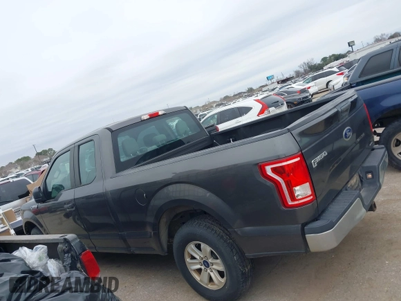 2015 Ford F-150 XL with VIN 1FTEX1CF6FKF02242, listed as a IAAI auction lot 41478528 with 144,197 mi miles. Bid and sale history available at carsss.com. Image 14.