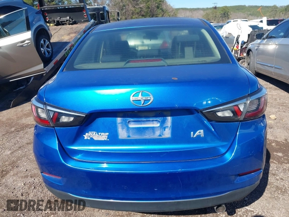 2016 Scion iA with VIN 3MYDLBZV0GY126847, listed as a IAAI auction lot 41588599 with 137,966 mi miles. Bid and sale history available at carsss.com. Image 16.