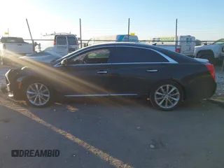 2014 Cadillac XTS Luxury with VIN 2G61M5S32E9289279, listed as a IAAI auction lot 41279495 with 106,655 mi miles. Bid and sale history available at carsss.com. Image 15.