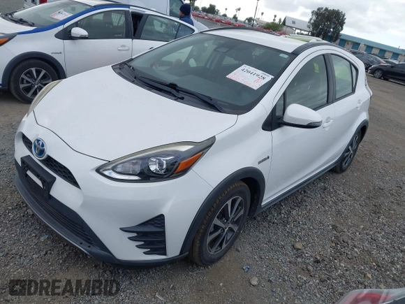 2018 Toyota Prius One with VIN JTDKDTB35J1615449, listed as a IAAI auction lot 42041928 with 59,870 mi miles and . Bid and sale history available at DreamBid. Image 2.