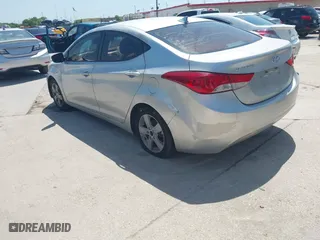 2013 Hyundai Elantra GLS with VIN KMHDH4AE6DU723373, listed as a IAAI auction lot 42007764 with 189,724 mi miles. Bid and sale history available at carsss.com. Image 3.