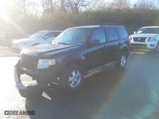 2011 Ford Escape XLT with VIN 1FMCU9DG4BKC30933, listed as a IAAI auction lot 40828476 with 146,808 mi miles. Bid and sale history available at carsss.com. Image 2.