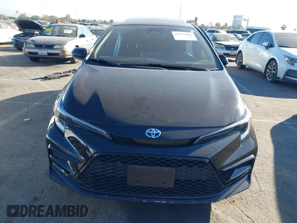 2023 Toyota Corolla Hybrid LE with VIN JTDBCMFE6P3001785, listed as a IAAI auction lot 41337266 with 25,829 mi miles. Bid and sale history available at carsss.com. Image 12.