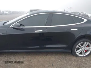 2014 Tesla Model S 60 with VIN 5YJSA1H1XEFP36008, listed as a IAAI auction lot 41287240 with 48,171 mi miles and . Bid and sale history available at DreamBid. Image 15.