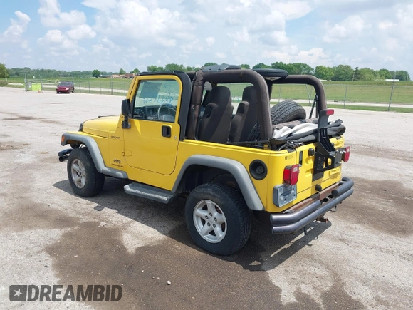 2004 Jeep Wrangler Sport z VIN 1J4FA49S04P701986, wystawiony jako IAAI lot #42256648 z przebiegiem 129 946 mil mil oraz . Historia ofert i sprzedaży dostępna na DreamBid. Obrazek 3.