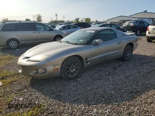 2000 Pontiac Firebird Firebird z VIN 2G2FS22K5Y2116520, wystawiony jako Copart lot #70697134 z przebiegiem 140 412 mil mil oraz Tytuł czysty. Historia ofert i sprzedaży dostępna na DreamBid. Obrazek 1.