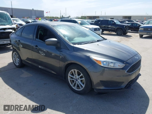 2018 Ford Focus SE with VIN 1FADP3F2XJL302358, listed as a IAAI auction lot 41807622 with 76,145 mi miles. Bid and sale history available at carsss.com. Image 1.